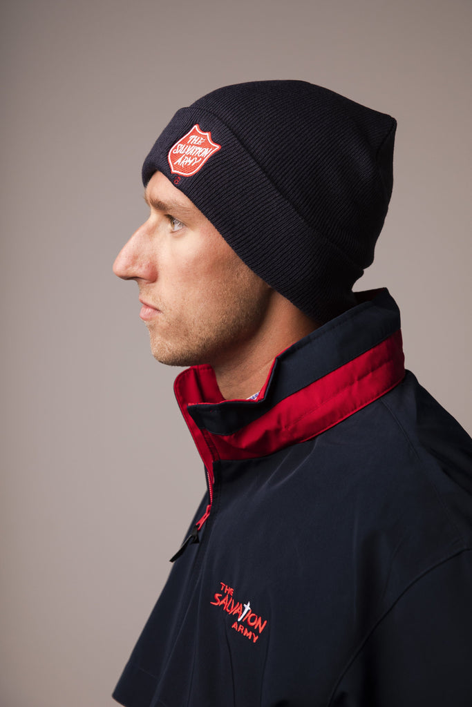 Blue Knit Hat with Red Shield
